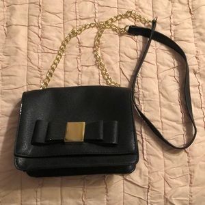 Black purse with bow